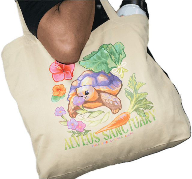 Rocky holding the Pushpop Tote Bag